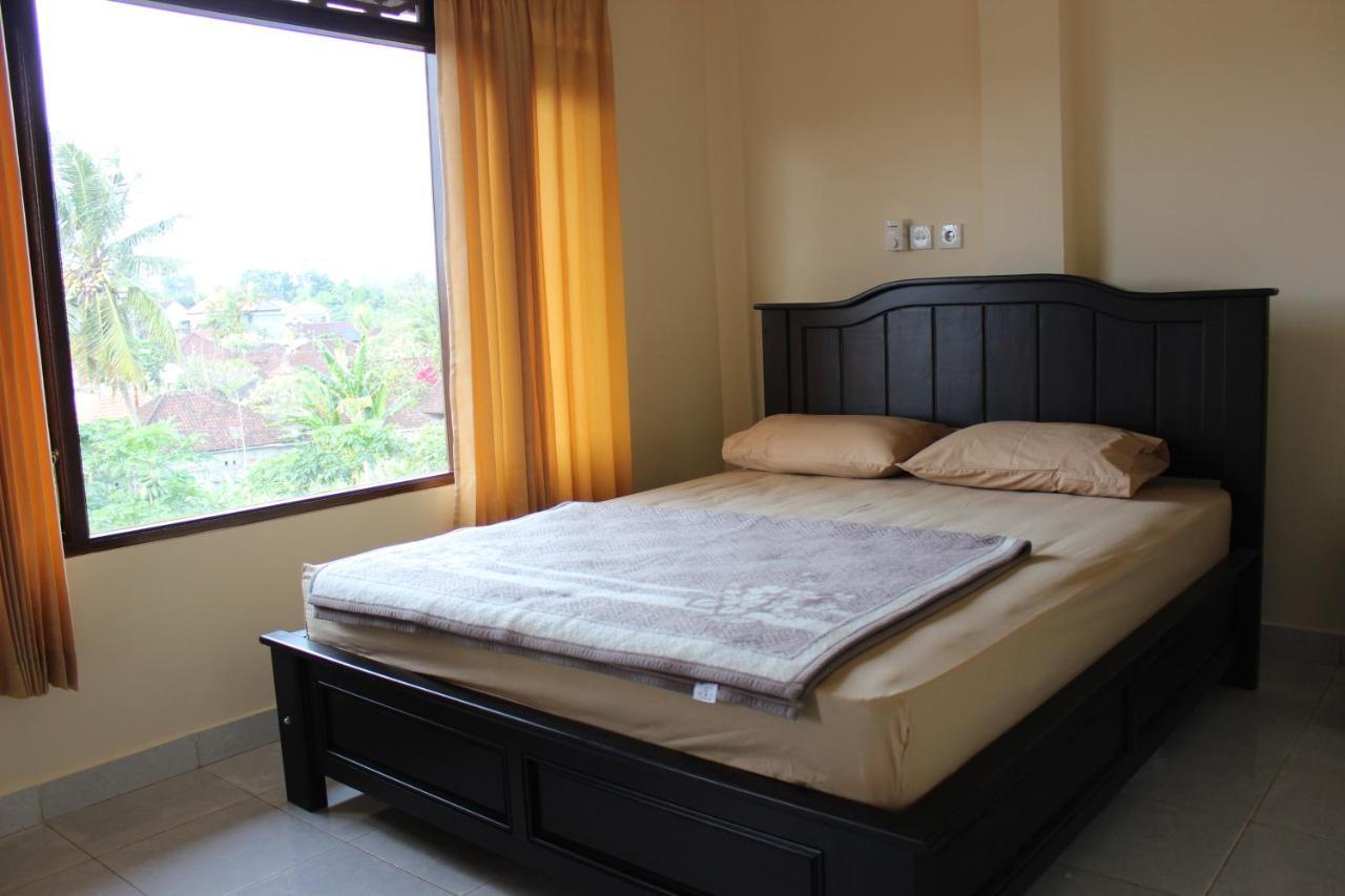 Appartement Tutick House à Ubud Chambre photo